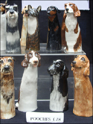 Fun ceramic dogs at the Apple Market in Covent Garden