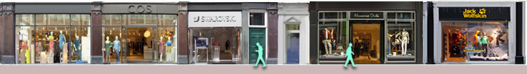 Long Acre shops: COS clothing, Swarovski crystals, Jack Wolfskin outdoor clothing
