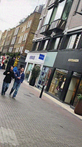 Another London hotspot: the walking girl artwork and the Soho mural