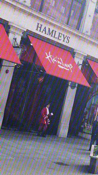 Another London hotspot: dancing in the toyshop doorway