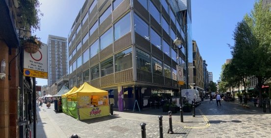 Hot food stalls in Berwick Street market in London's Soho