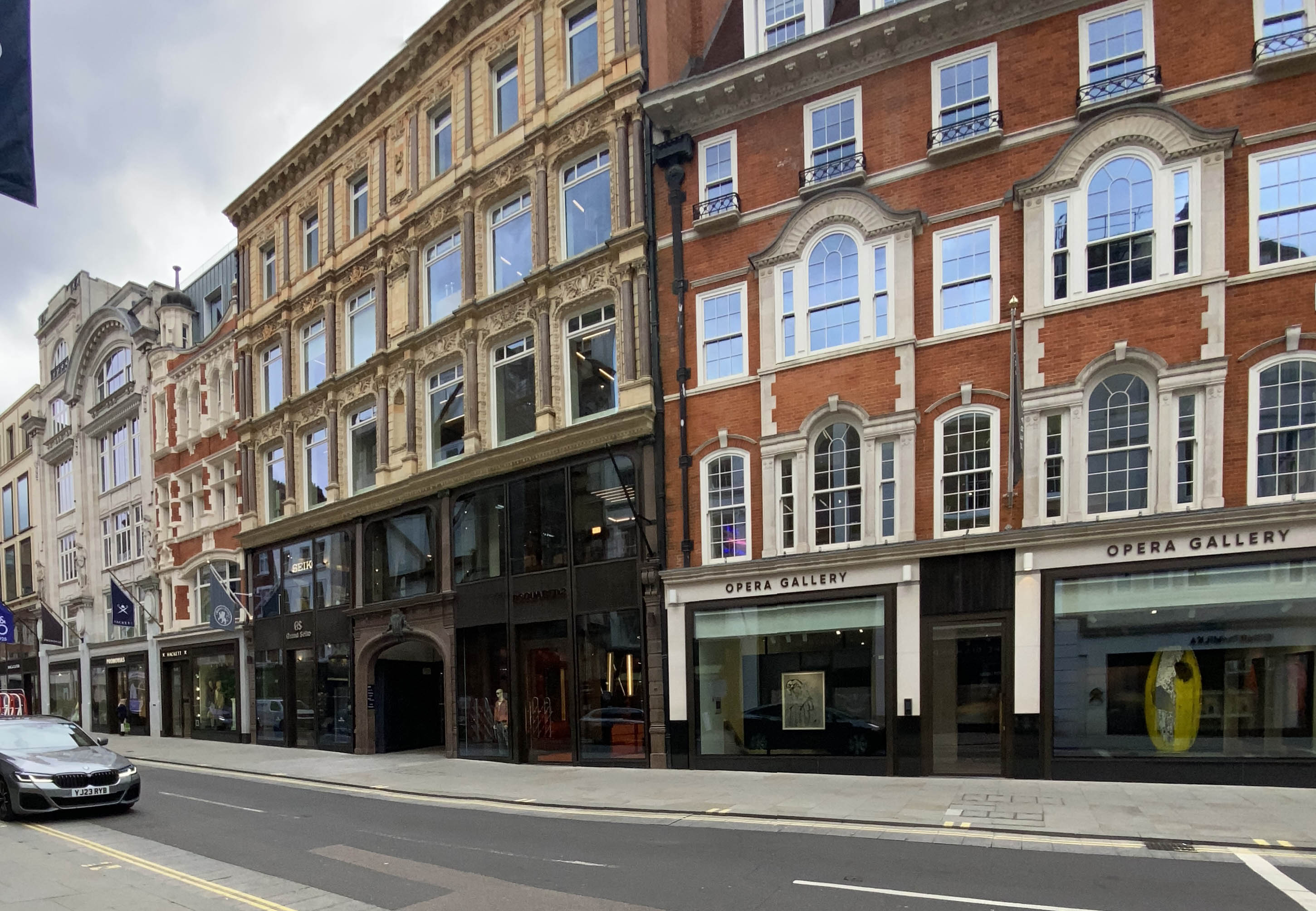 View of New Bond Street in London, with the passage to Medici Court