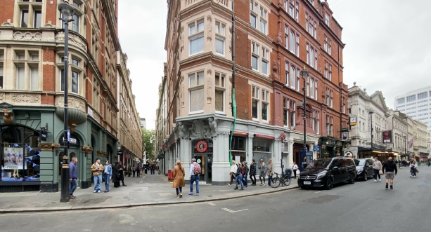 Cecil Court in London, at the junction with Saint Martin's Lane
