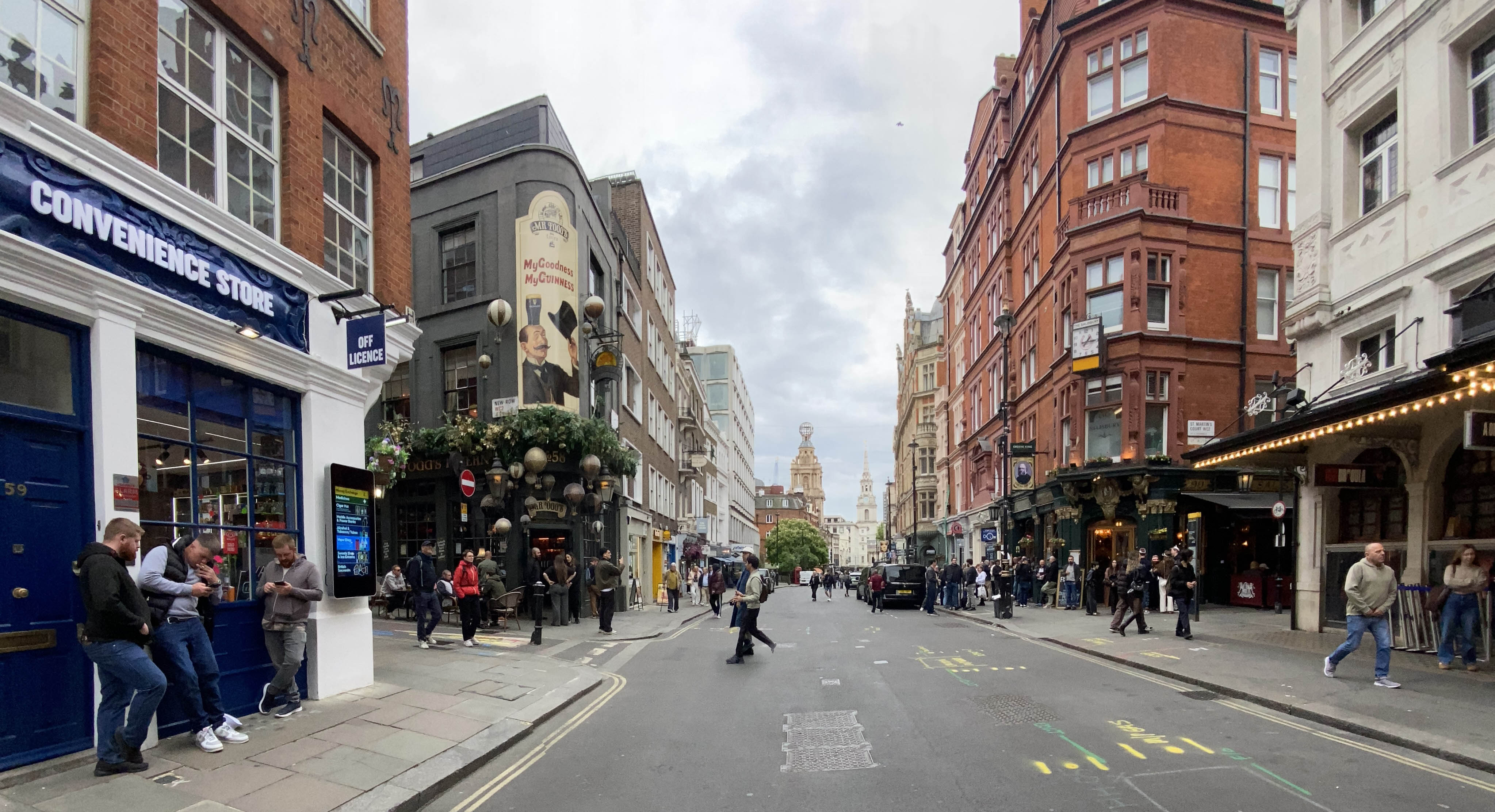 View down Saint Martin's Lane with Mr Fogg's Tavern and The Salisbury pub