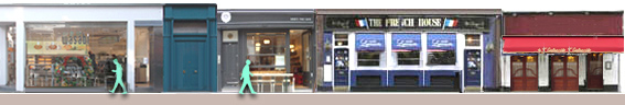 Dean Street, with Rosa's Thai cafe, The French House pub, Le Relais de Venise