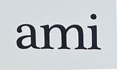 Sign at Ami Paris store on Sloane Street in London