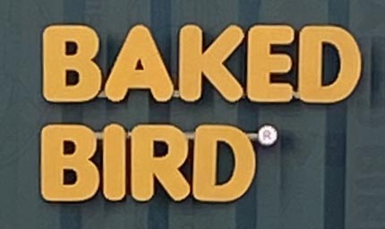 Sign at Baked Bird on Goodge Street in London