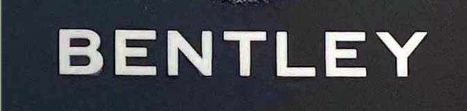 Sign at Bentley showroom on Bruton Street in London