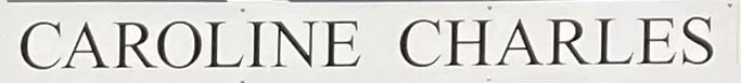 Caroline Charles shop sign on Beauchamp Place in London's Knightsbridge