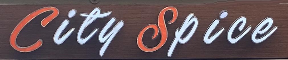 Sign at City Spice restaurant on London's Brick Lane