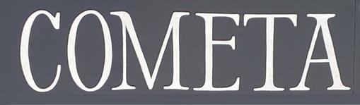 Sign at Cometa restaurant on Charlotte Street in London