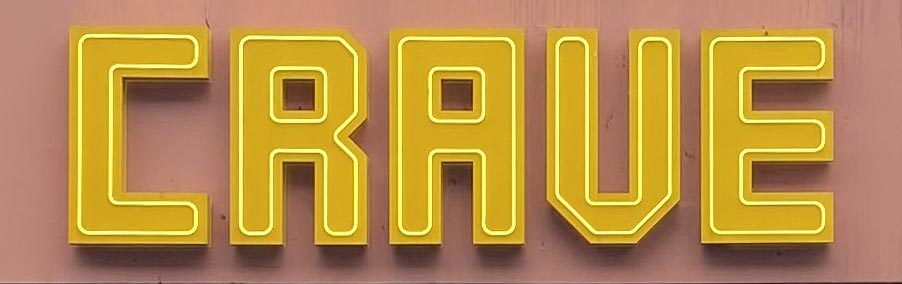 Sign at Crave pizzaria on London's Brick Lane