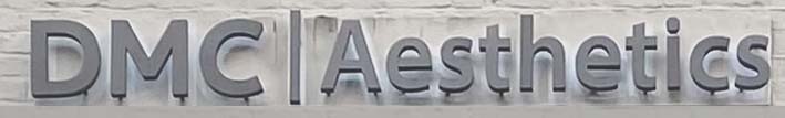 Sign at DMC Aesthetics salon on Beauchamp Place in London