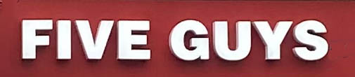 Five Guys sign on Kensington High Street