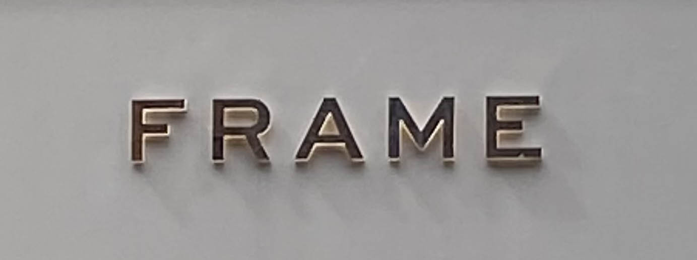 Sign at Frame store on Marylebone High Street