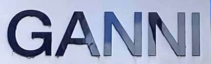 Sign at Ganni shop on Floral Street in London's Covent Garden