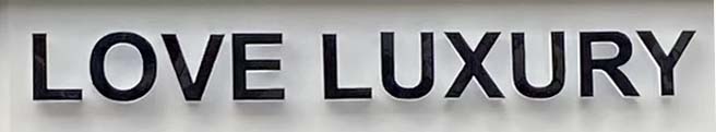 Sign at Love Luxury shop on Beauchamp Place in Knightsbridge, London