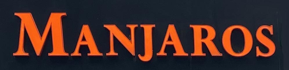 Sign at Manjaros restaurant on London's Brick Lane