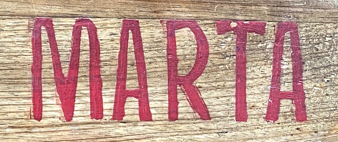 Sign at Marta pizza restaurant on Fulham Road in London