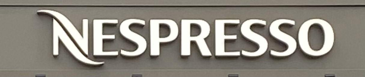 Sign at Nespresso store in London's Covent Garden