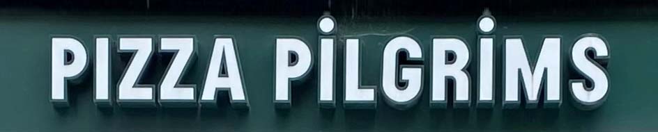 Sign at Pizza Pilgrims restaurant on Dean Street in London's soho