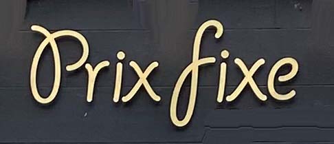 Sign at Prix Fixe restaurant on London's Dean Street in Soho