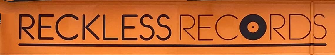 Sign at Reckless Records shop on Berwick Street in London's Soho