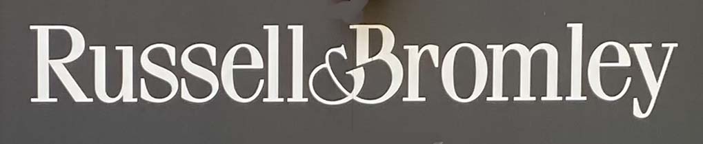 Sign at Russell and Bromley shoe shop near Covent Garden station
