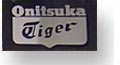 Onitsuka Tiger shop sign on Newbugh Street
