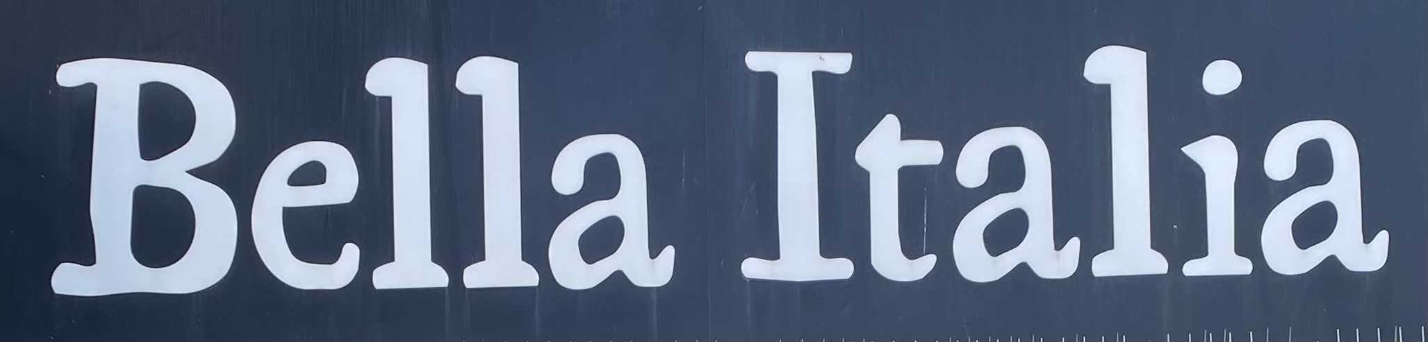 Sign at Bella Italia restaurant on London's Queensway