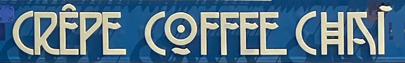 Sign at Crepe Coffee and Chai cafe in London