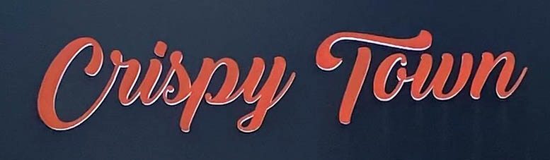 Crispy Town sign on London's Portobello Road