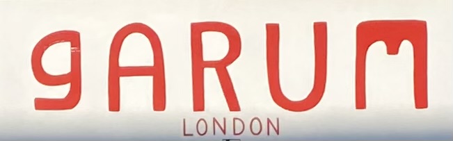 Sign at Garum Italian restaurant on Queensway