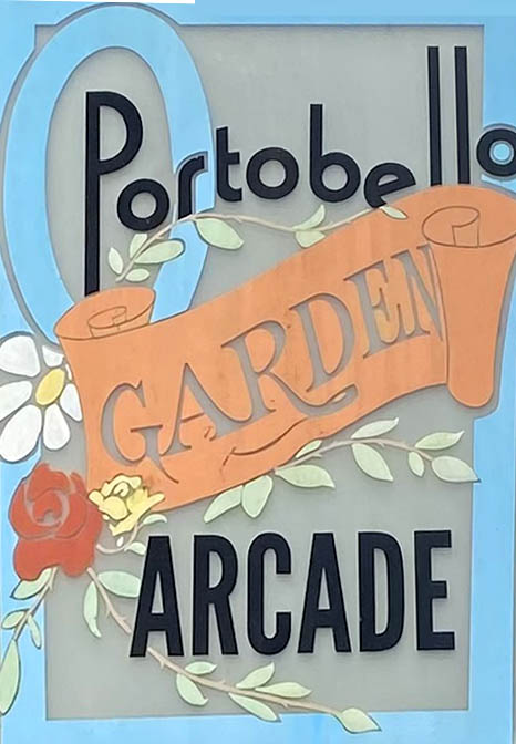 Sign at Portobello Garden Arcade on Portobello Road in London