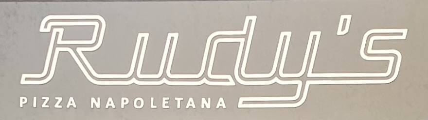 Sign at Rudy's restaurant on London's Queensway