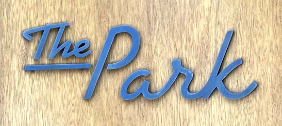 Sign at The Park cafe/restaurant on Queensway in London