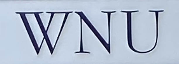 Sign at WNU shop on Ledbury Road in London's Notting Hill