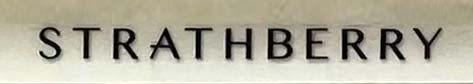 Sign at Strathberry shop on King's Road in Chelsea, London