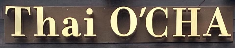 Sign at Thai O'Cha restaurant on London's Brick Lane