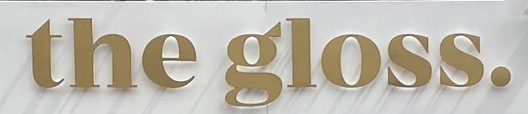 Sign at The Gloss salon on Walton Street, London