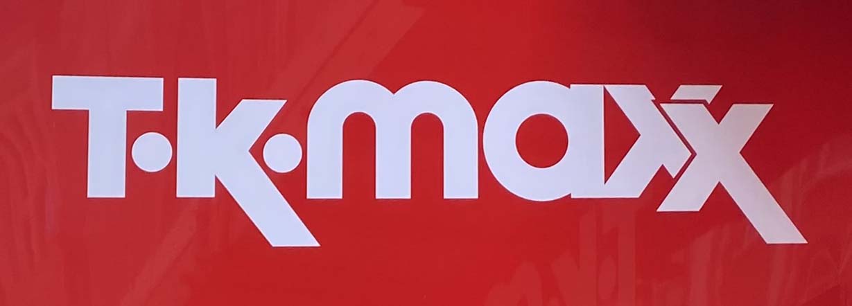 Sign at TK Maxx store on Long Acre in Covent Garden