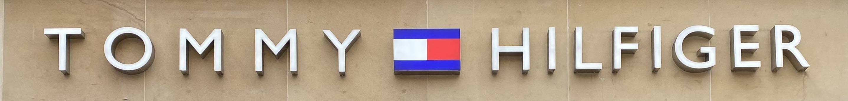 Sign at Tommy Hilfiger store on Brompton Road in London's Knightsbridge