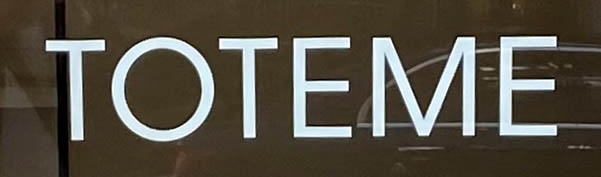 Sign at Toteme shop on Mount Street in London's Mayfair