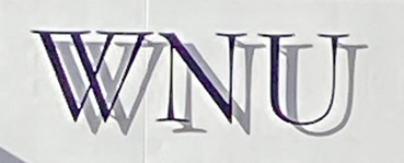 Shop sign at WNU on Marylebone High Street in London