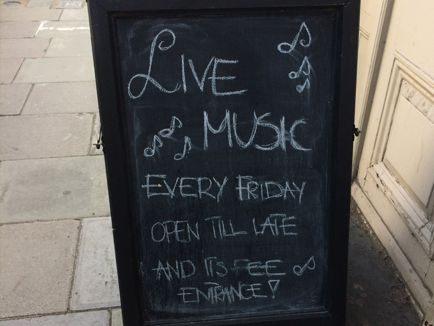Live music blackboard outside the Castle pub on Portobello Road