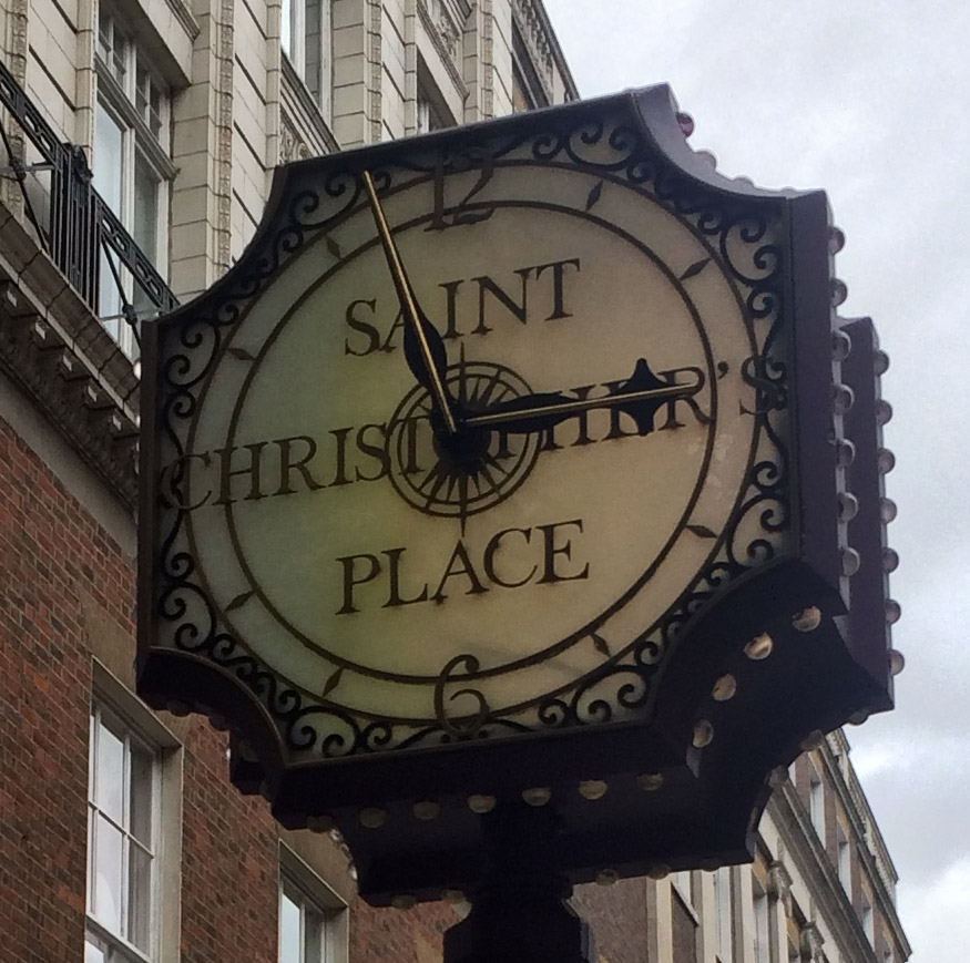 Clock at the entrance to Saint Christopher's Place in London